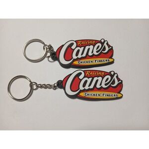 Two Raising Canes Chicken Fingers Rubber Keychain 2.5 Inches X 1 Inch